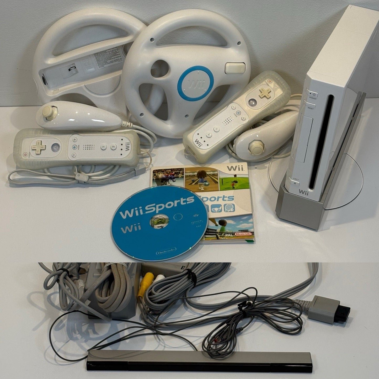 Nintendo Wii White Console x2 Controllers/Nunchucks/Steering Wheel + Wii Sports