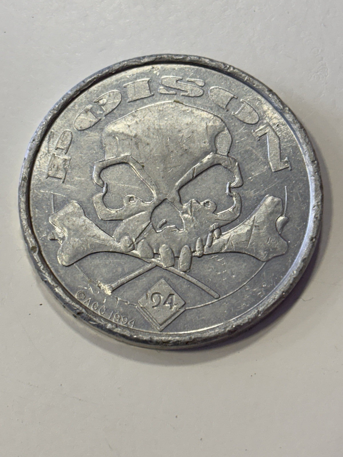 1990s American game caps aluminum pog slammer heavy metal. Dragon gargoyle