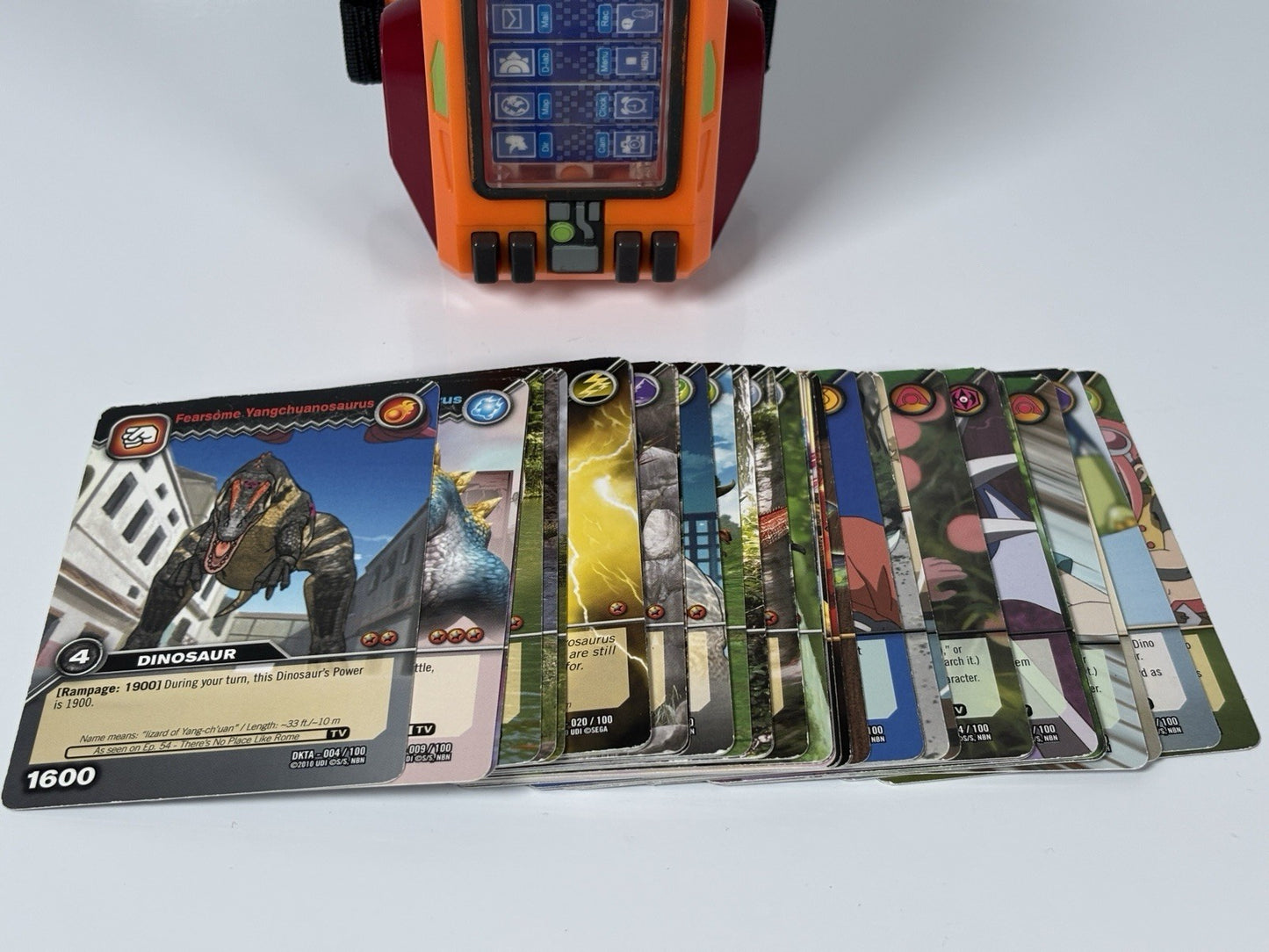 Rare Dinosaur King Bracer Card Swiper + 38x DKTA Trading Cards (No Duplicates)