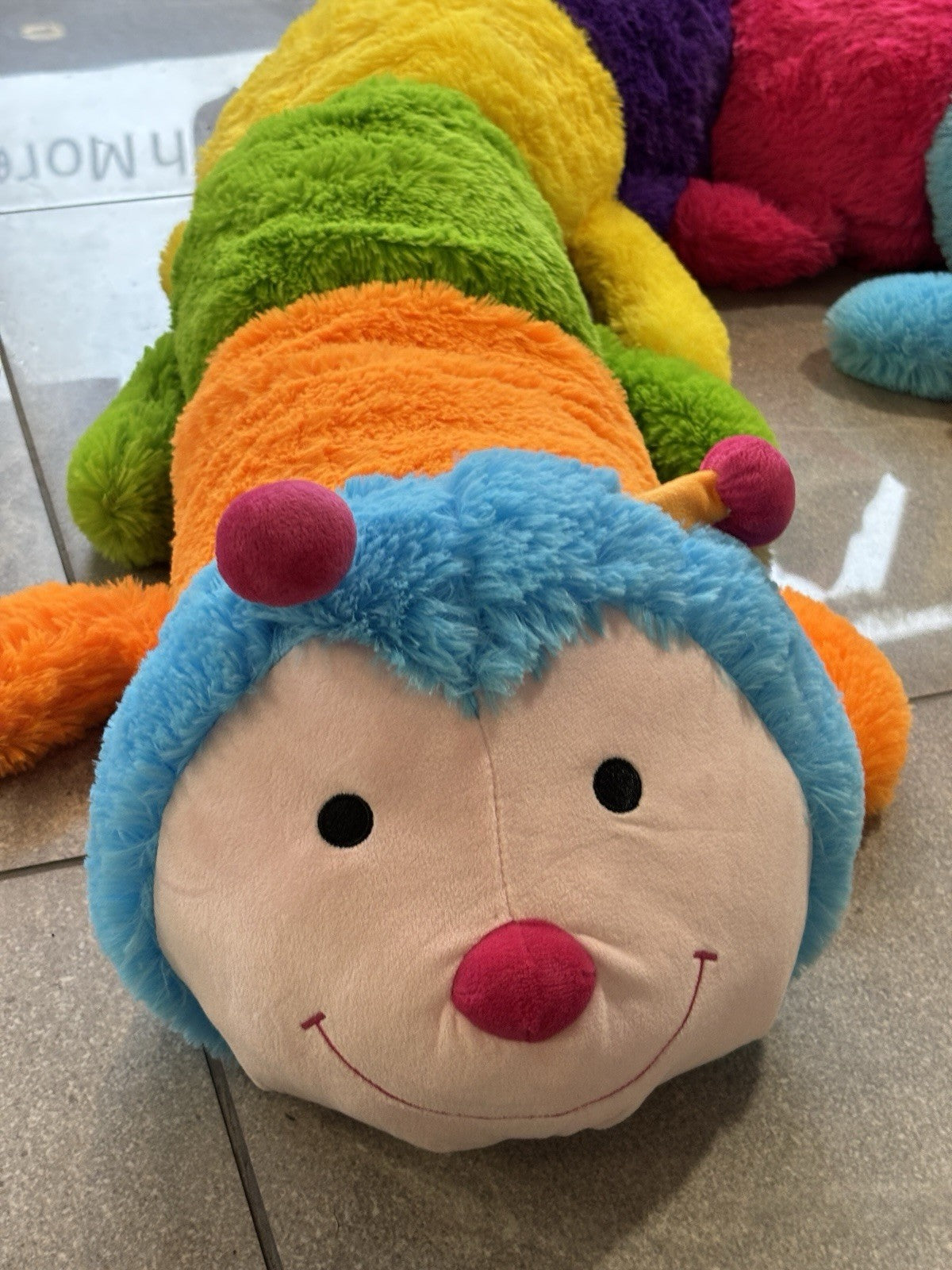 Smyths Toys XL Jumbo Long giant Caterpillar Soft plush Soft Toy Rainbow 7ft long