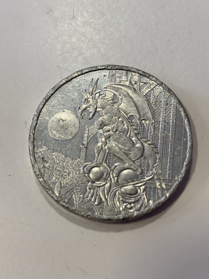 1990s American game caps aluminum pog slammer heavy metal. Dragon gargoyle