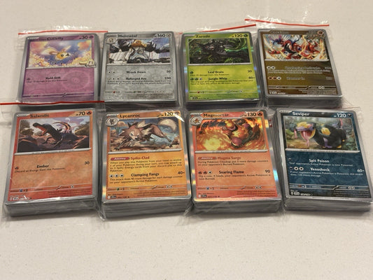 Pokémon Bundle 50x Cards - Minimum 5 Holo/Reverse Holo