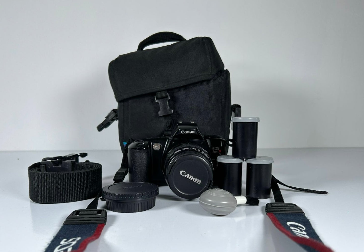 Canon Rebel X S 35mm SLR Film Camera with 35-80mm Lens, Bag & Film Tested