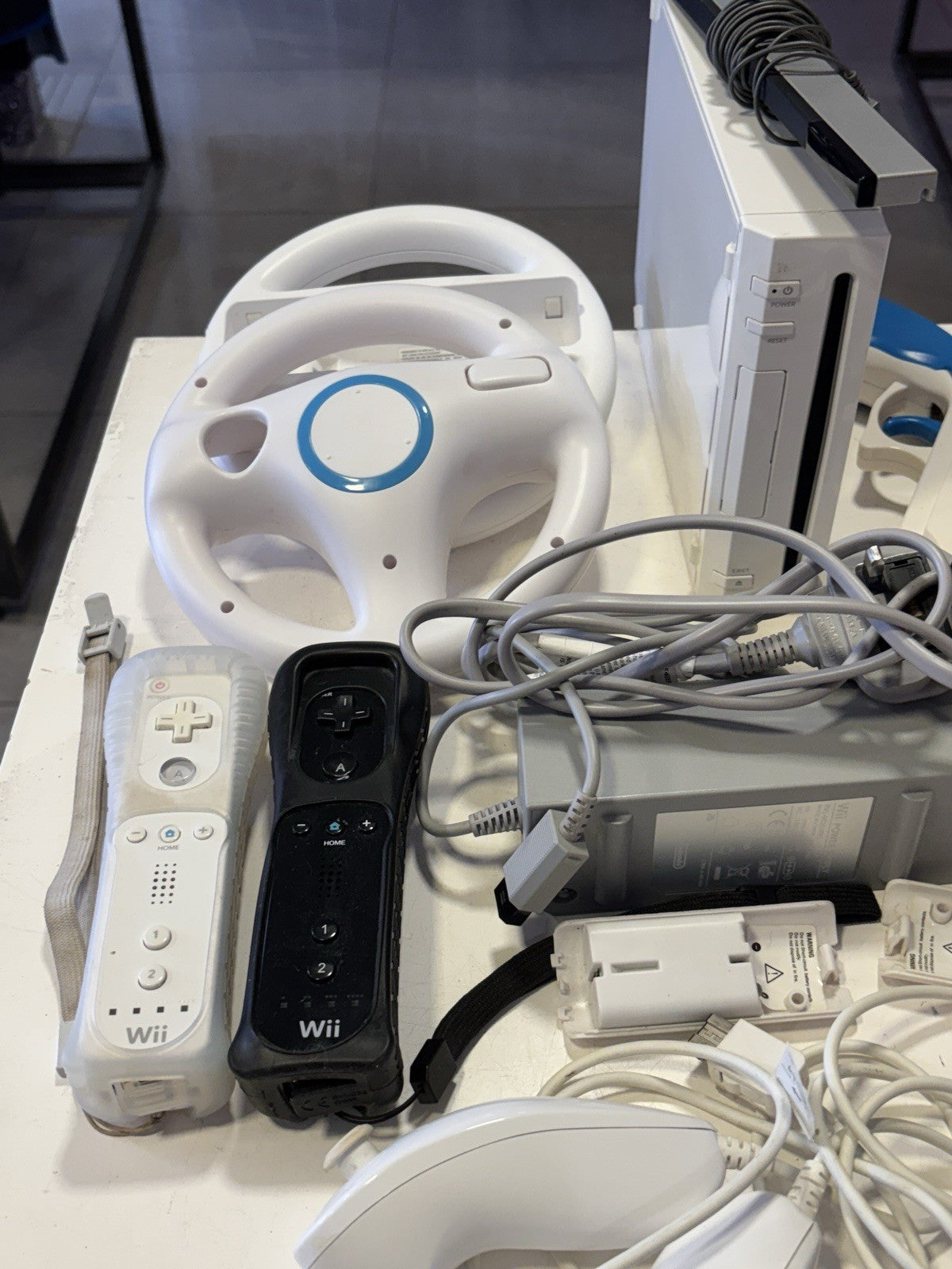 Nintendo Wii Console 2x Controllers 2x Wheels  2x Battery Charger Pack and Acc'
