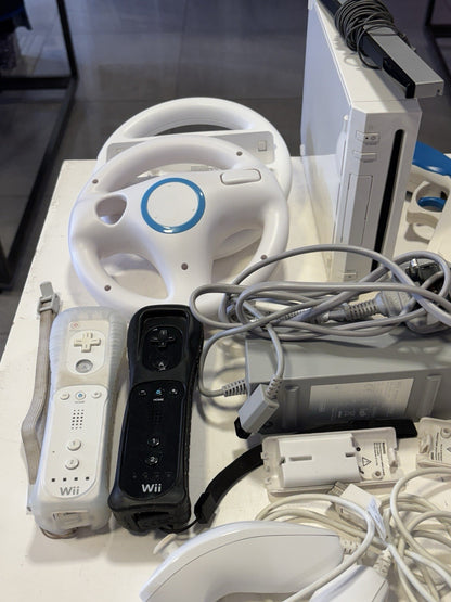 Nintendo Wii Console 2x Controllers 2x Wheels  2x Battery Charger Pack and Acc'