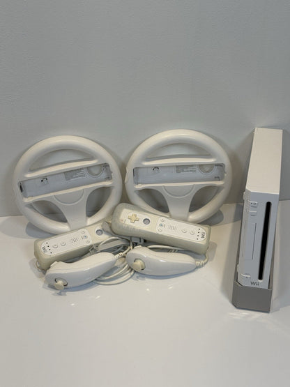 Nintendo Wii White Console x2 Controllers/Nunchucks/Steering Wheel + Wii Sports
