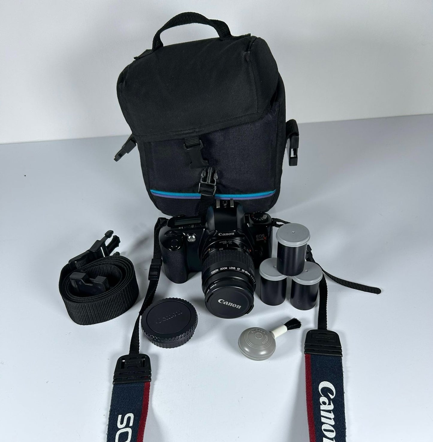 Canon Rebel X S 35mm SLR Film Camera with 35-80mm Lens, Bag & Film Tested