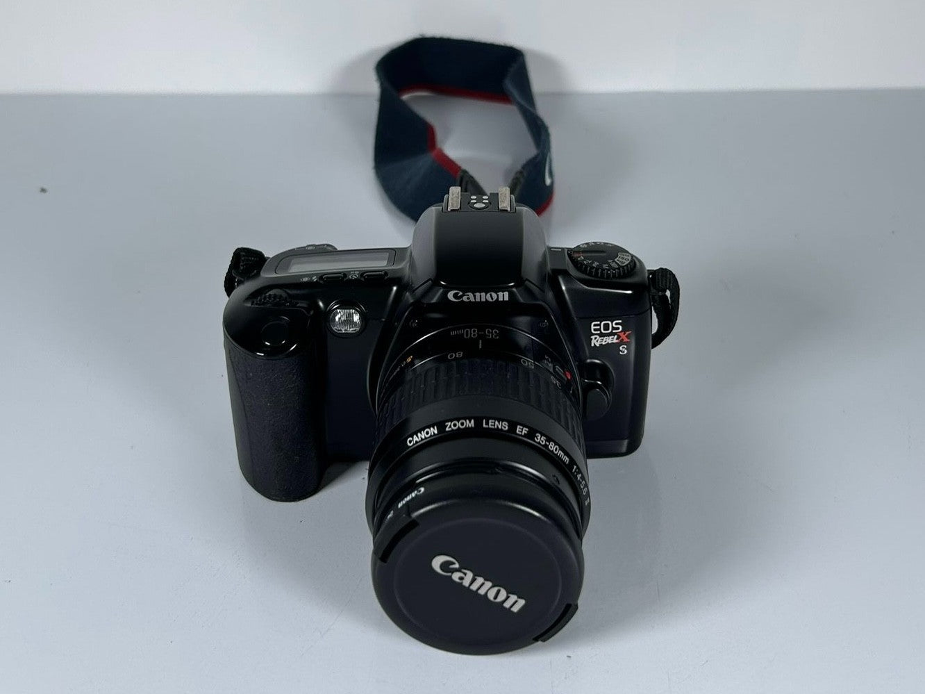 Canon Rebel X S 35mm SLR Film Camera with 35-80mm Lens, Bag & Film Tested